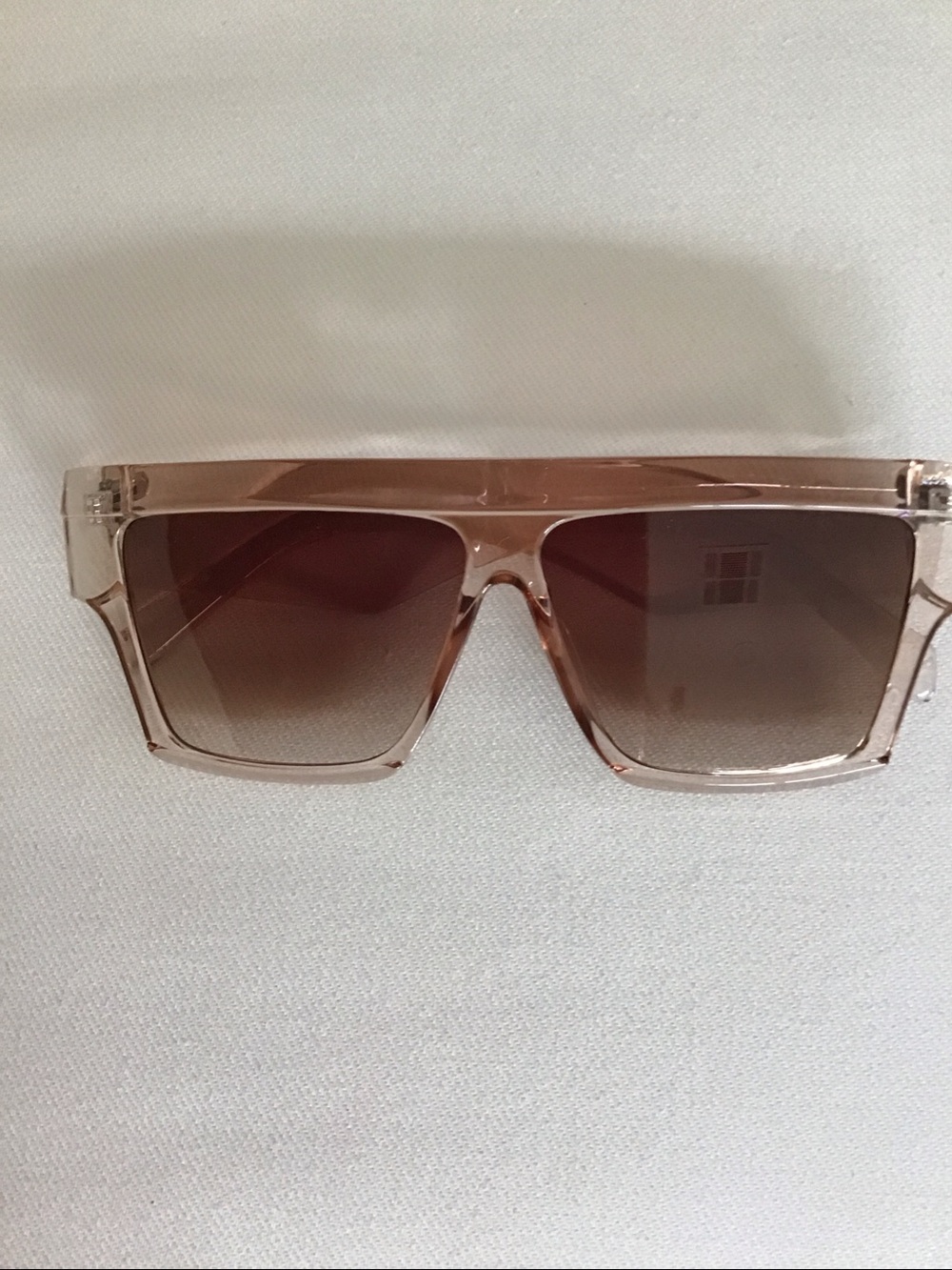 Sunglasses, peaches color.